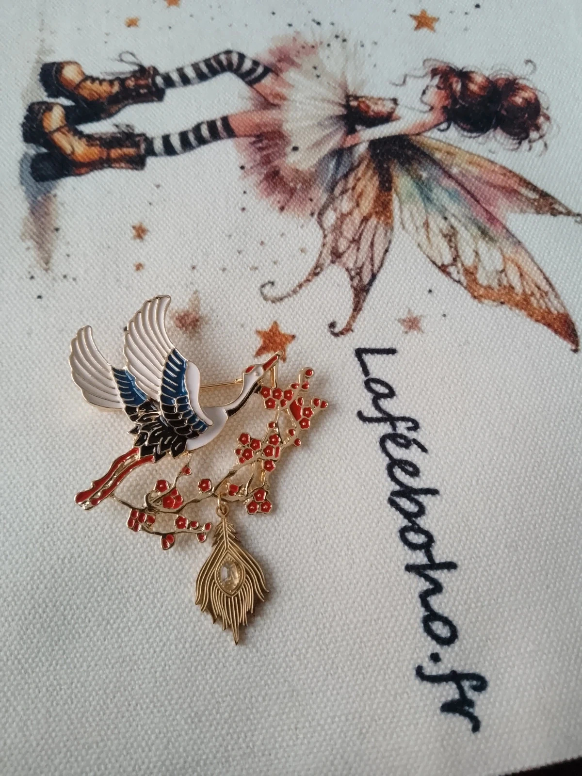 broche cigogne pendentif plume pierre de lune